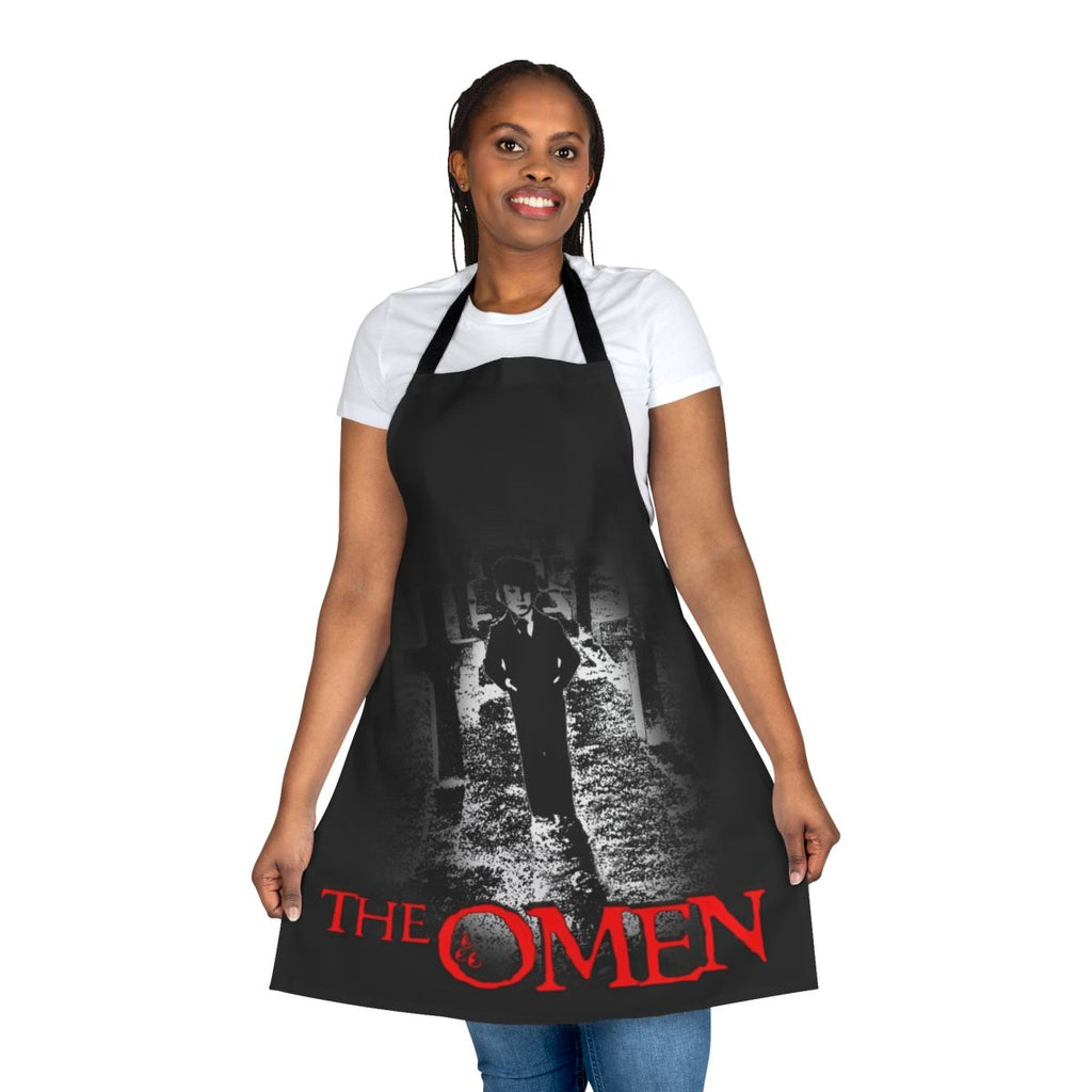 A black apron with a creepy design inspired by the horror movie "The Omen"