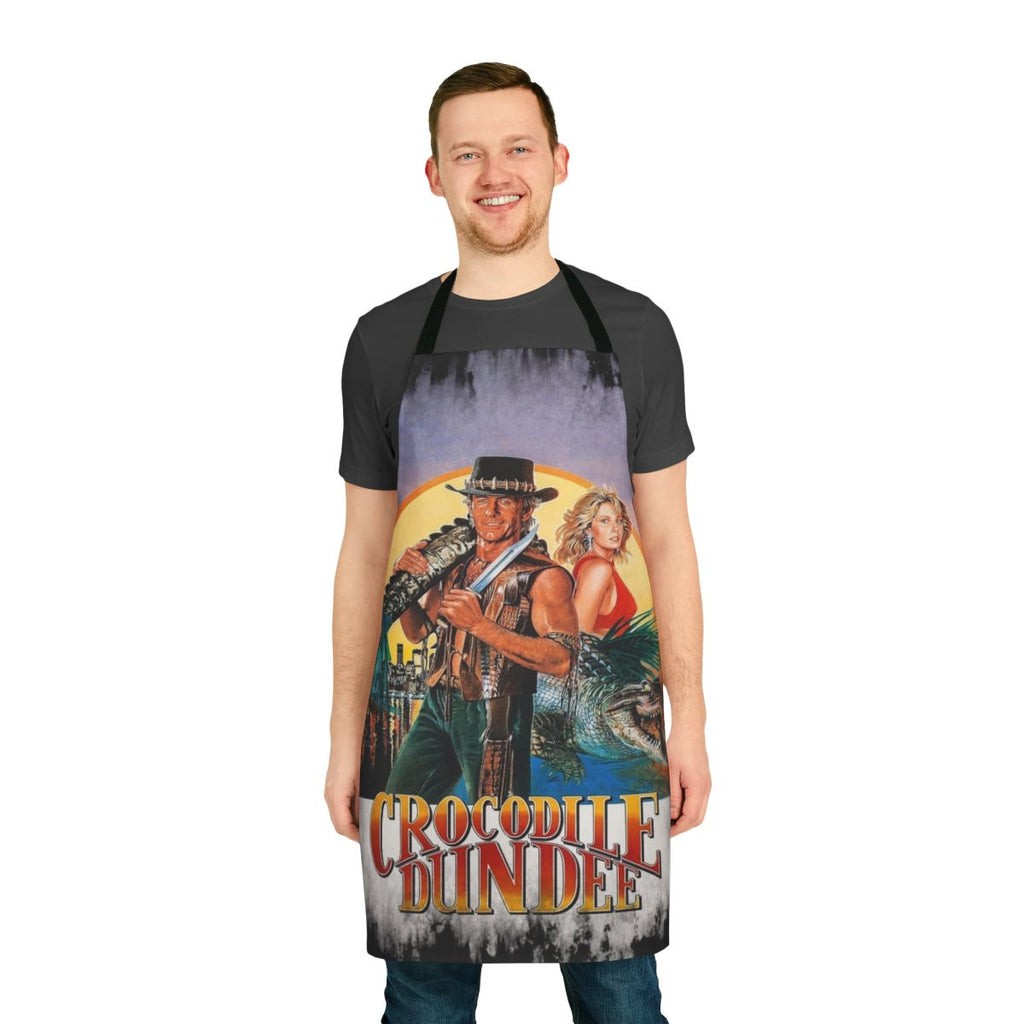 Crocodile Dundee-themed apron featuring iconic Australian imagery and characters
