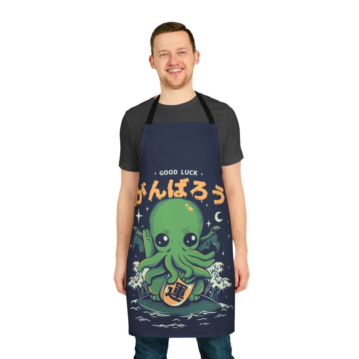 A whimsical, Cthulhu-inspired apron featuring a lucky charm design with a cat-like sea creature.
