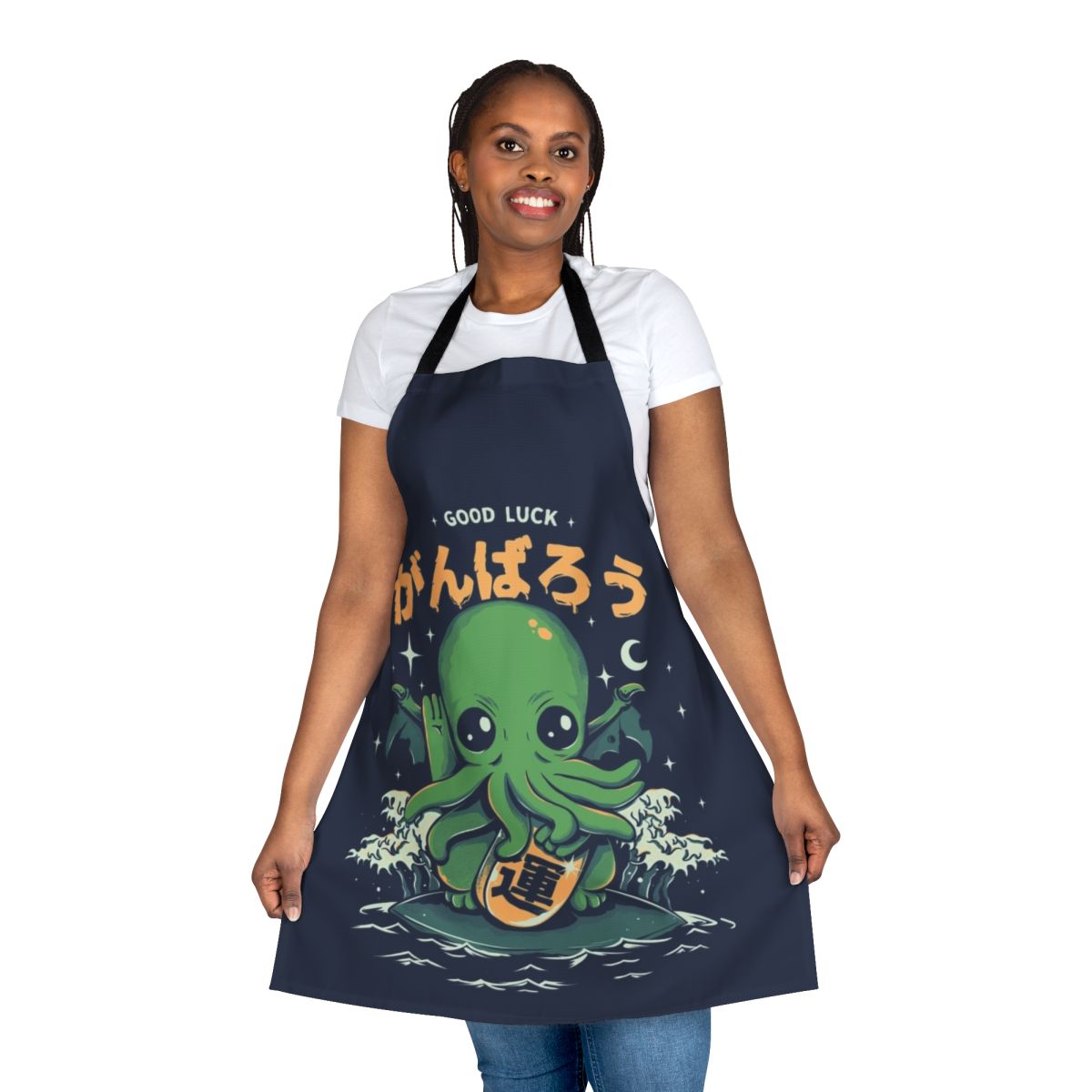 A whimsical, Cthulhu-inspired apron featuring a lucky charm design with a cat-like sea creature.