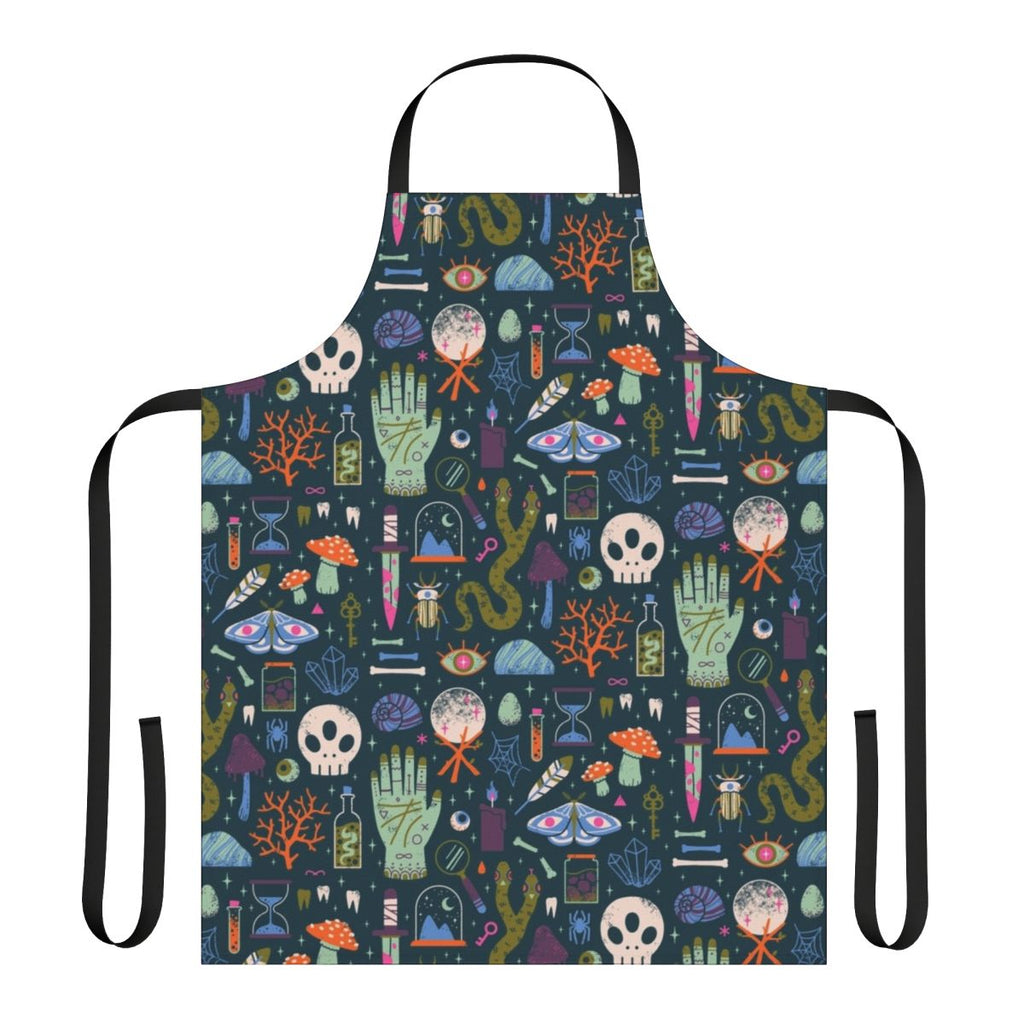 Curiosities apron featuring a collection of witchy, spooky, and occult elements