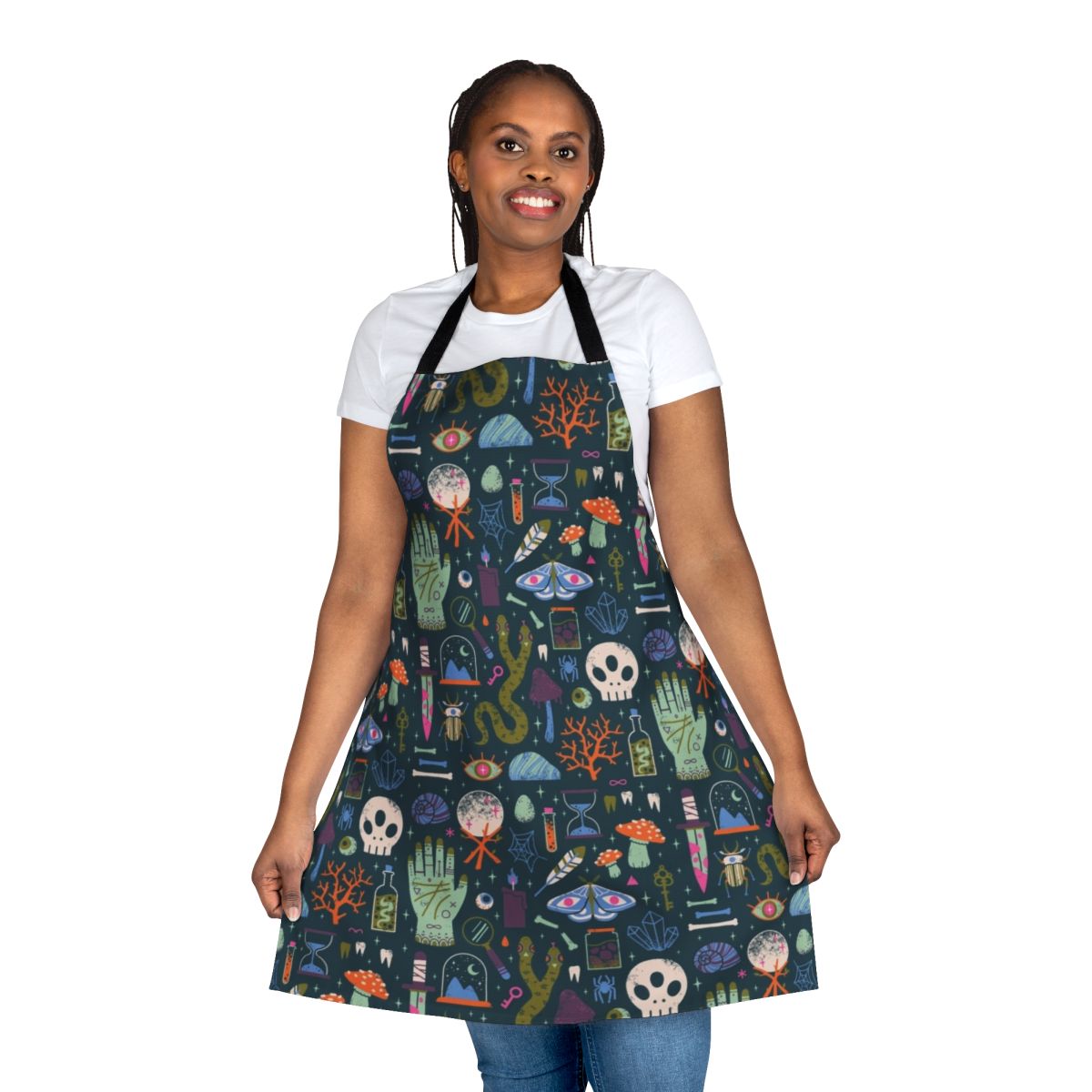 Curiosities apron featuring a collection of witchy, spooky, and occult elements