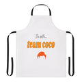 A durable and stylish apron featuring the "I'm With Team Coco" design in a thick font.