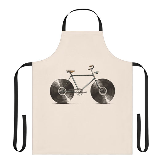 A colorful apron featuring musical notes, bikes, and vinyl records, perfect for kitchen or workshop use.
