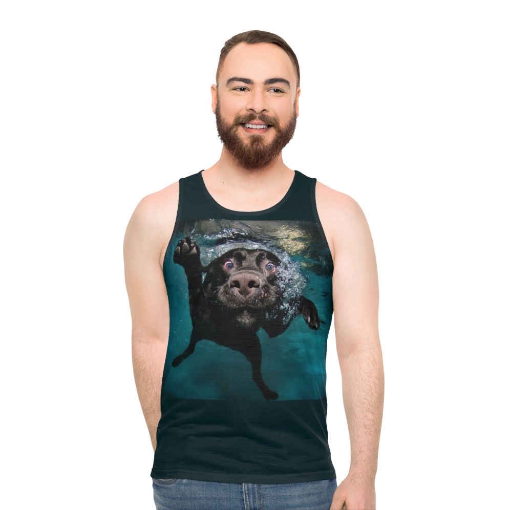 Cute dog swimming underwater in tank top
