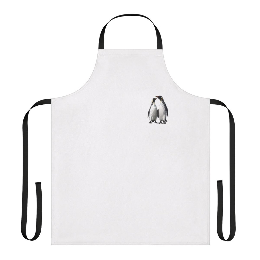 Two adorable black and white penguins on a winter-themed apron