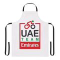 Cycling enthusiast wearing an apron featuring the UAE Team Emirates pro cycling team logo and colors