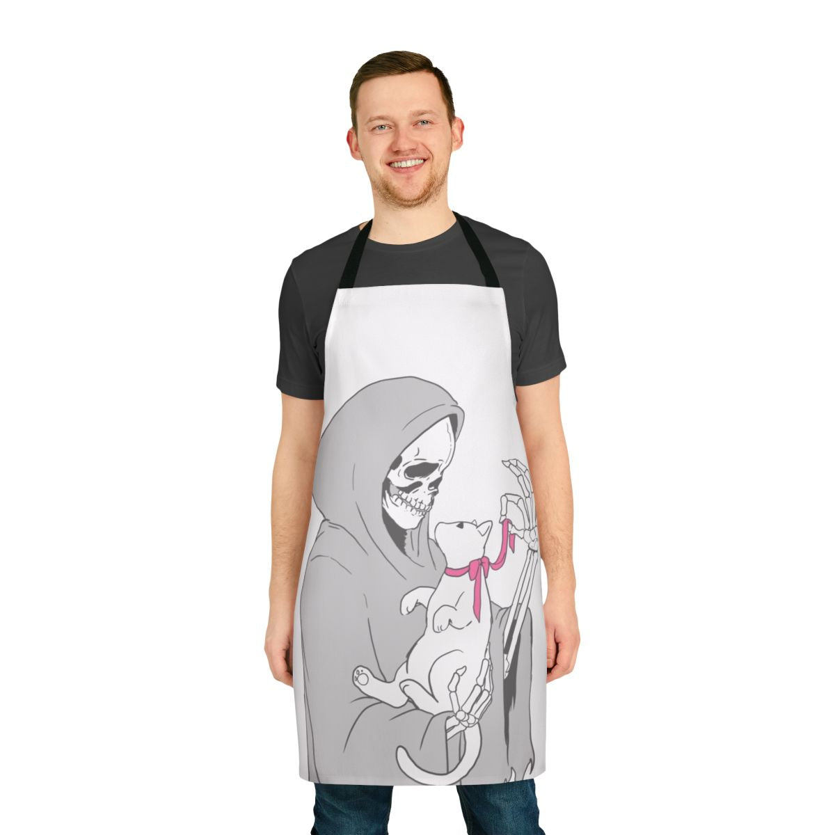 Illustration of a grim reaper figure holding a playful kitten, printed on a kitchen apron