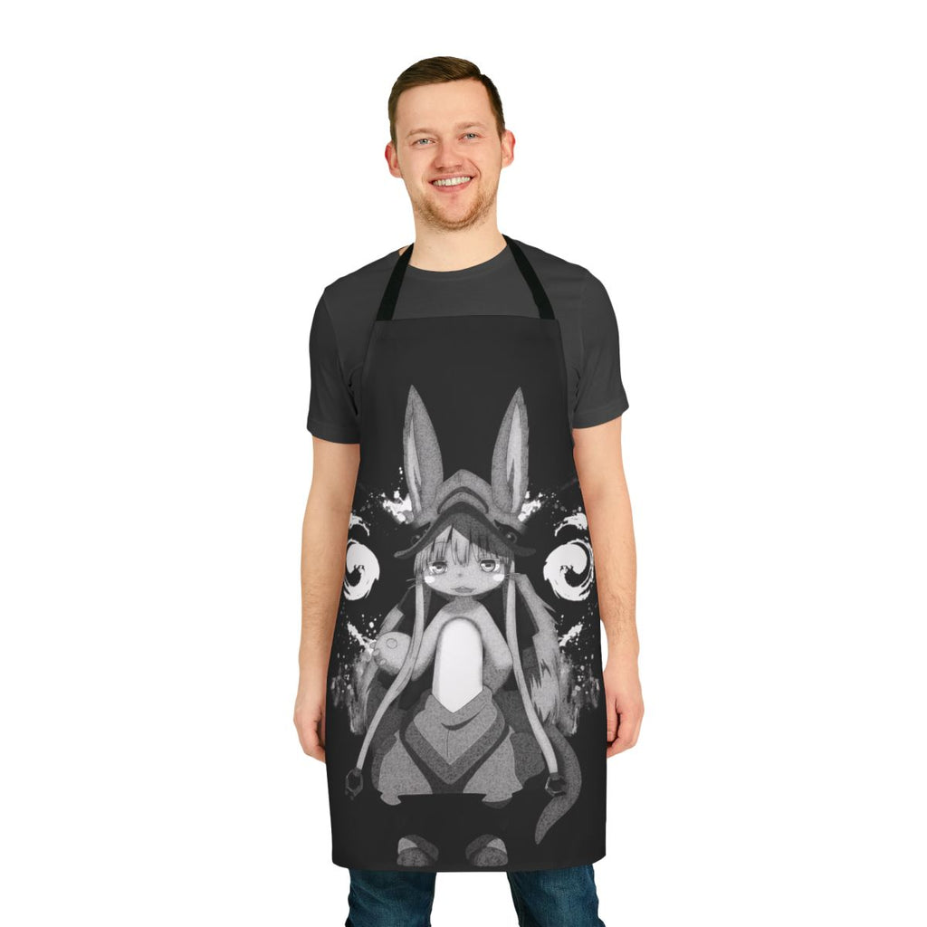 "Dark fantasy apron with anime-inspired monochrome design, featuring splatters, stains, and ink elements inspired by the 'Made in Abyss' series."