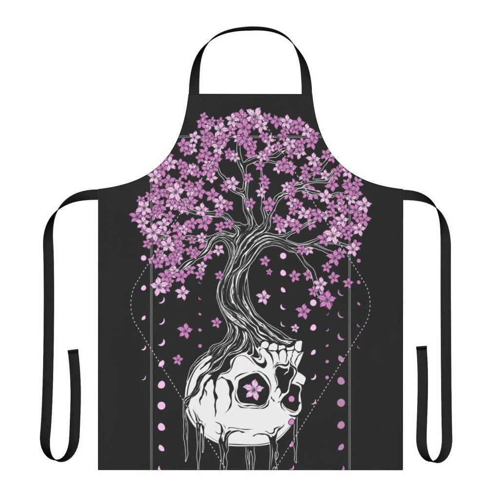 A black apron with a skull and cherry blossom design, a gothic and macabre style perfect for the kitchen.