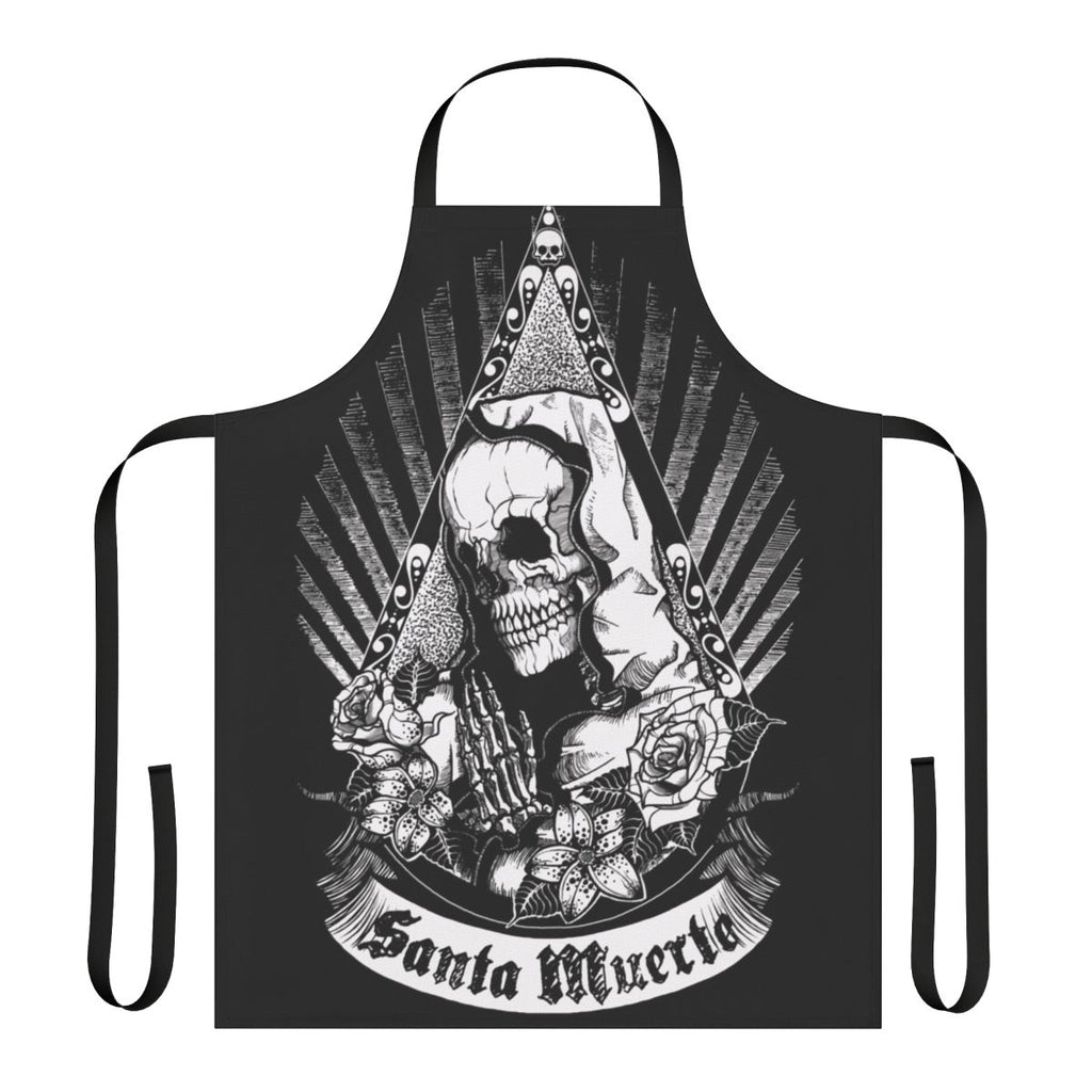 A black and white apron featuring a skull, skeleton, flowers, and the image of Santa Muerte, the Mexican folk saint.