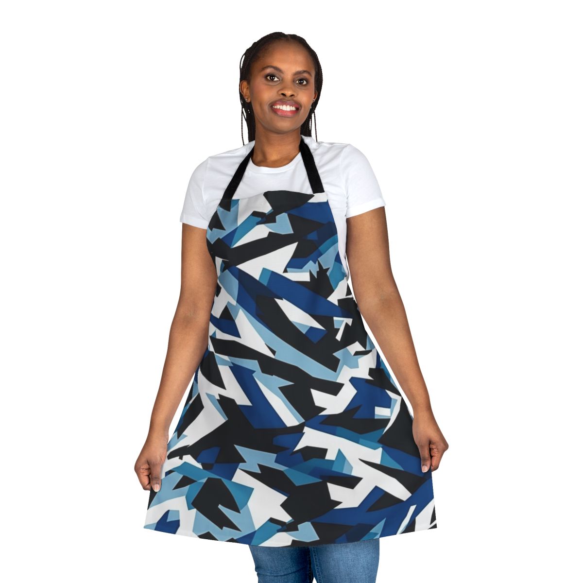 A navy blue apron with a dazzle camouflage pattern, a military-inspired kitchen accessory.