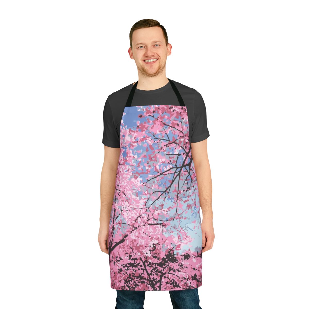 A vibrant cherry blossom-patterned apron, perfect for embracing the beauty of spring.