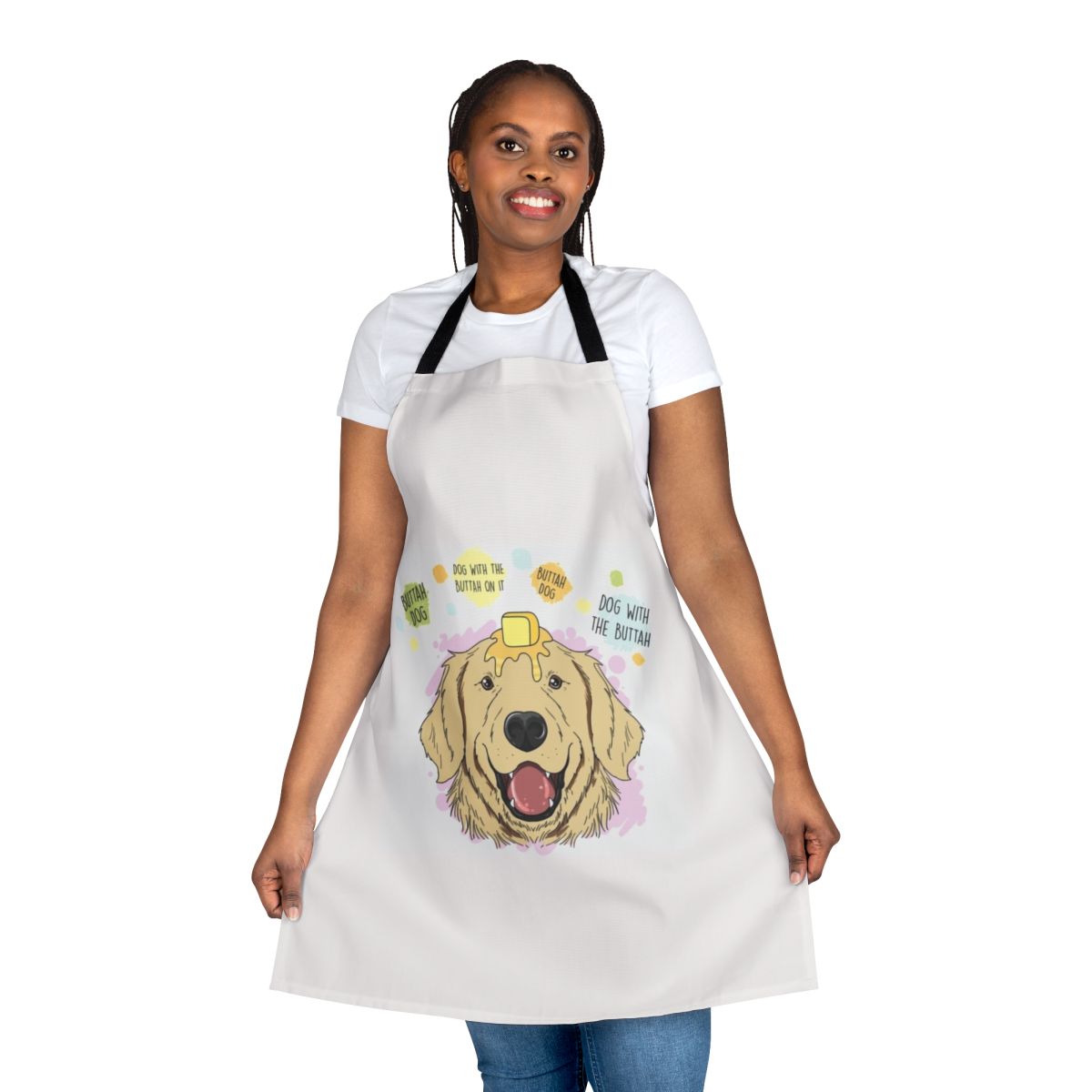 A white apron with a playful design of a dog with butter on its head.