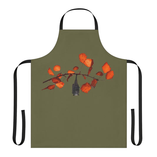 Moss green apron featuring a whimsical Batzilla design with leaves, branches, and hanging bats