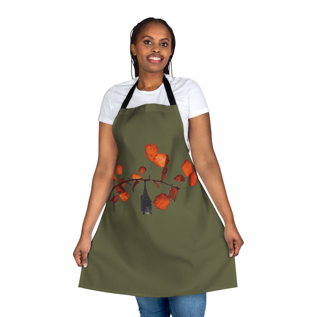 Moss green apron featuring a whimsical Batzilla design with leaves, branches, and hanging bats
