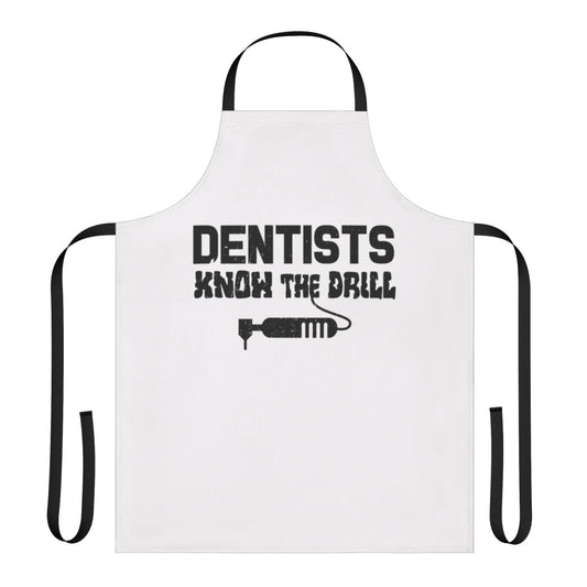 Dentist wearing an apron with the text "Dentists Know The Drill"