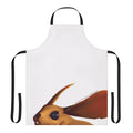 A beige apron with a desert mouse print, inspired by the sci-fi movie Dune.