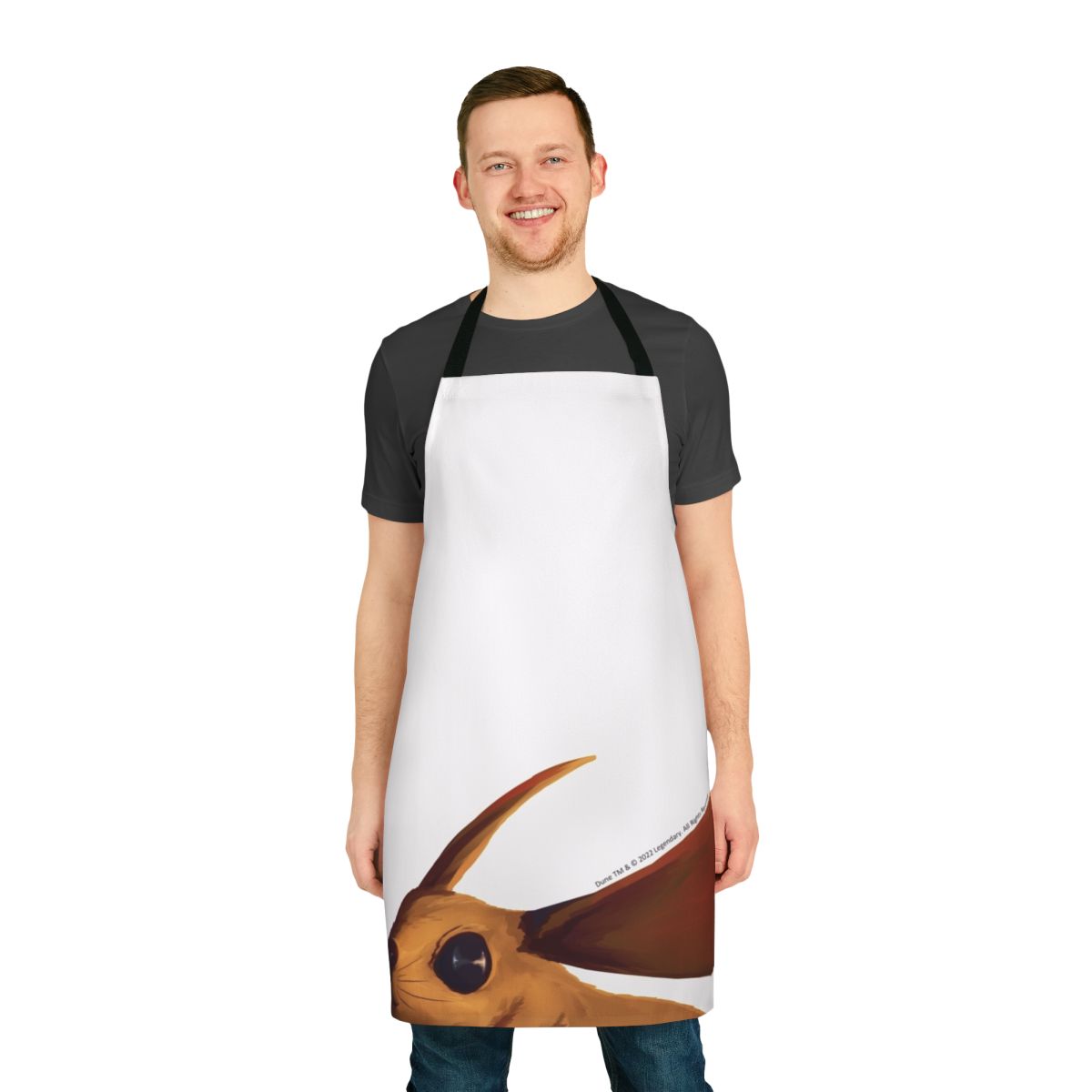 A beige apron with a desert mouse print, inspired by the sci-fi movie Dune.