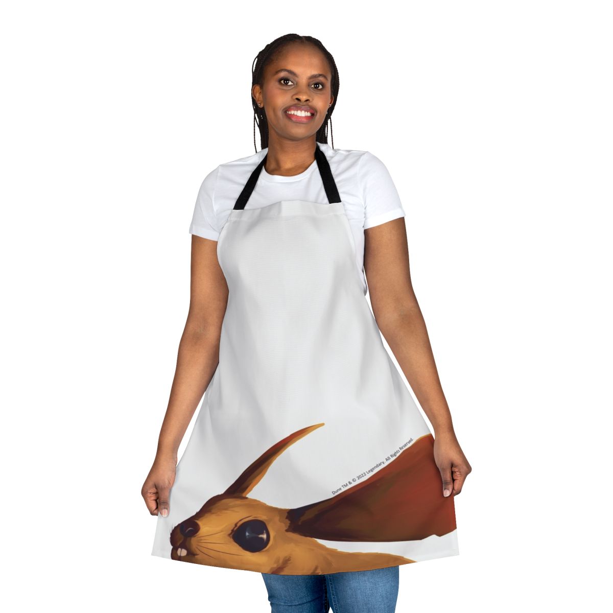 A beige apron with a desert mouse print, inspired by the sci-fi movie Dune.