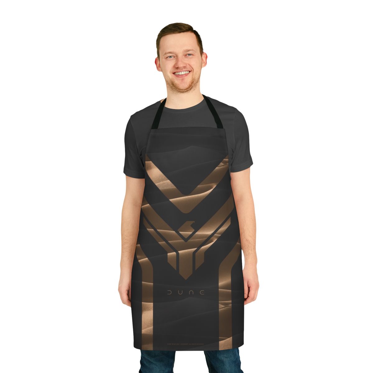 A stylish apron featuring desert imagery and the Dune logo, perfect for Dune fans