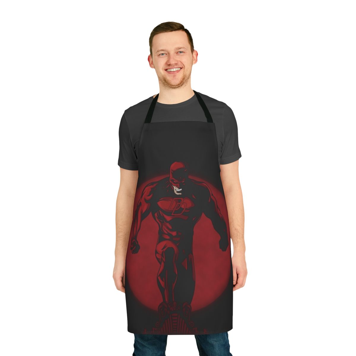 Red apron with a devilish, comic-inspired design, perfect for the heroic home chef