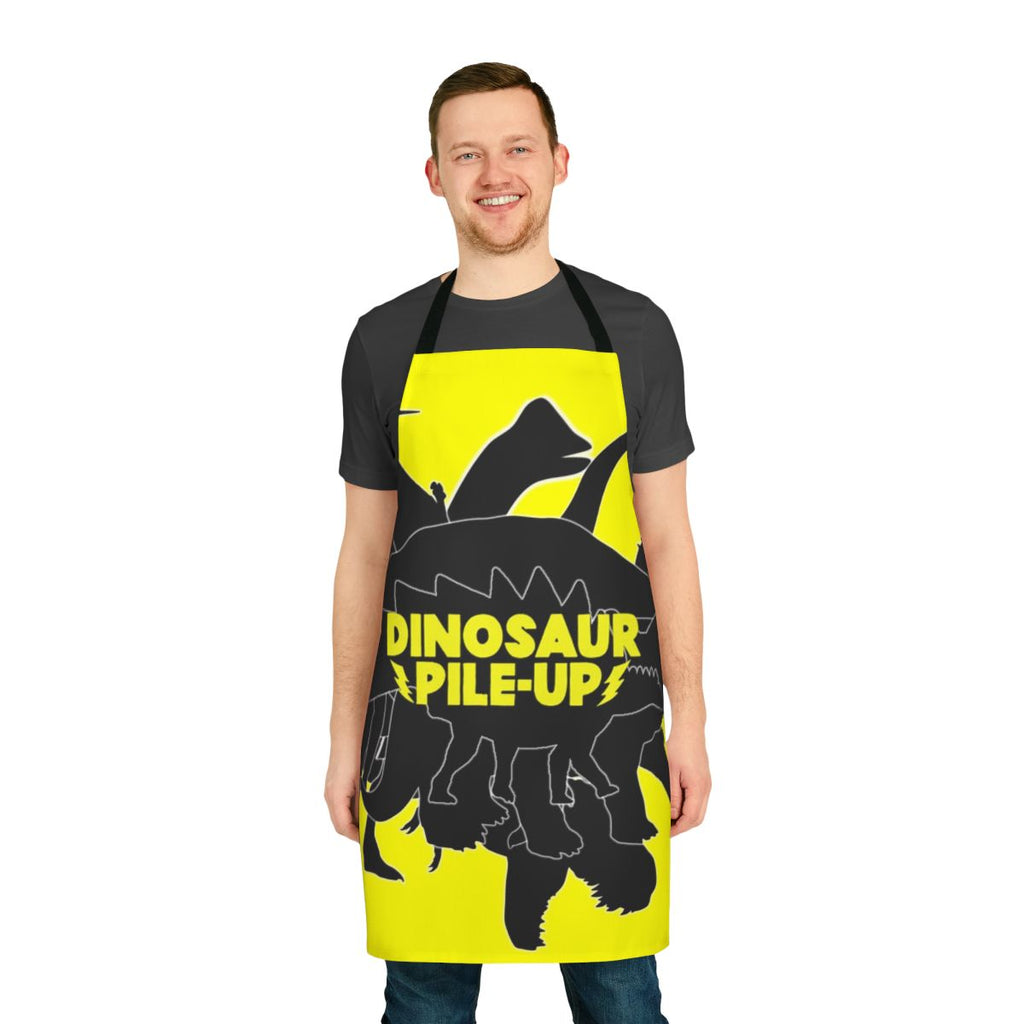 Dinosaur Pile Up themed apron with various dinosaur silhouettes