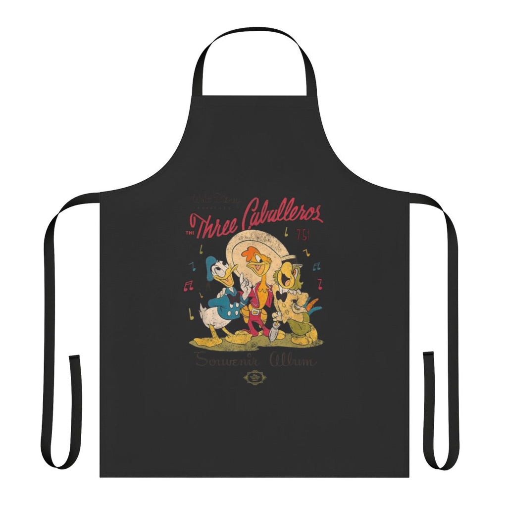 A colorful kitchen apron featuring the characters from the Disney film The Three Caballeros.