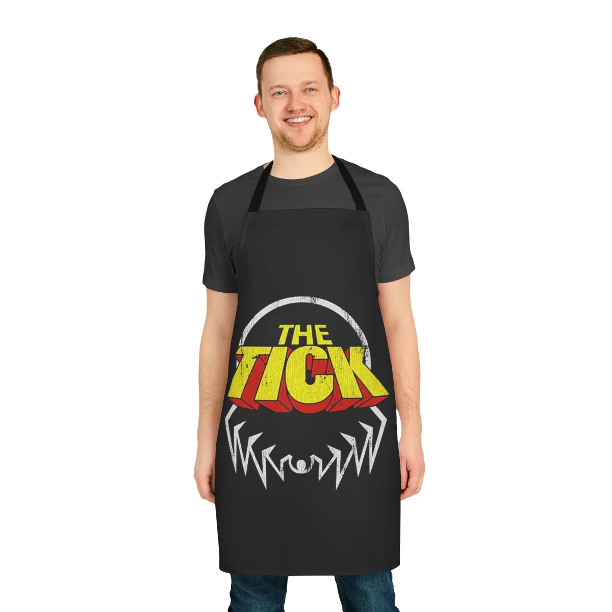 Distressed apron featuring the iconic spoon logo from the 90s cartoon series The Tick