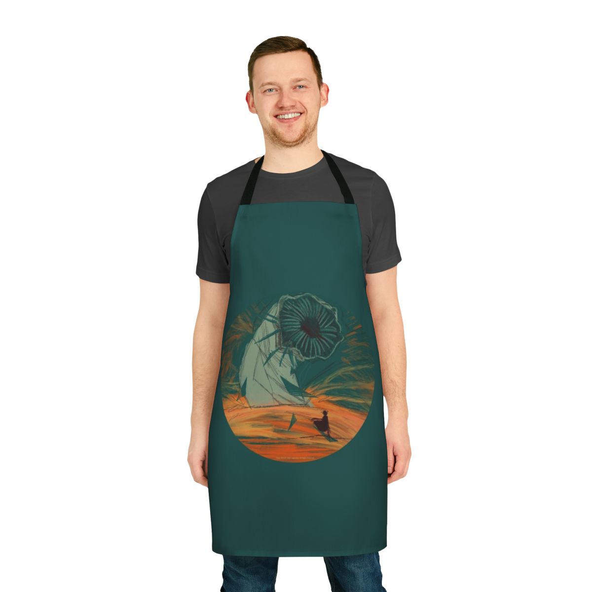 Dune-inspired apron featuring a sandworm design on a desert-themed background