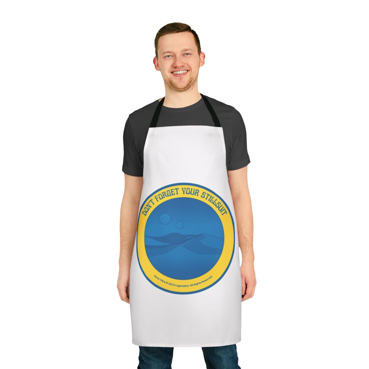 Dune-inspired apron featuring the desert landscape of Arrakis and a stylized stillsuit design