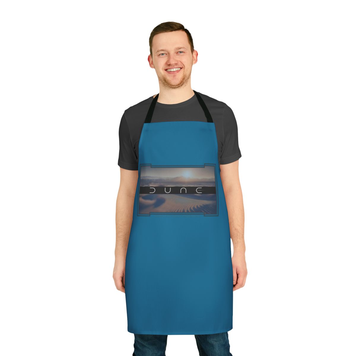 Dune-themed blue apron with desert and twin moons design