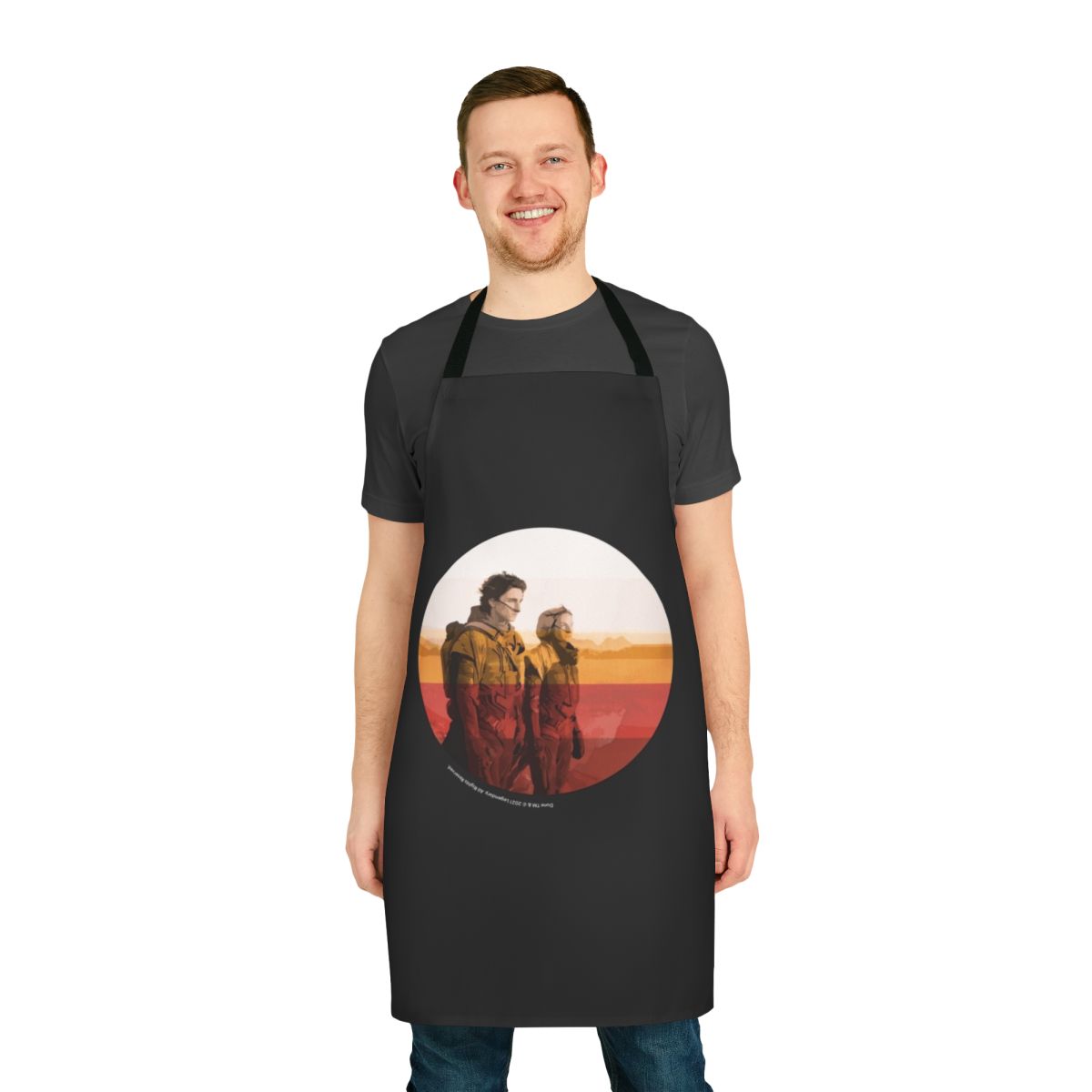 Dune-inspired apron featuring inkpress artwork with science fiction and desert planet motifs.