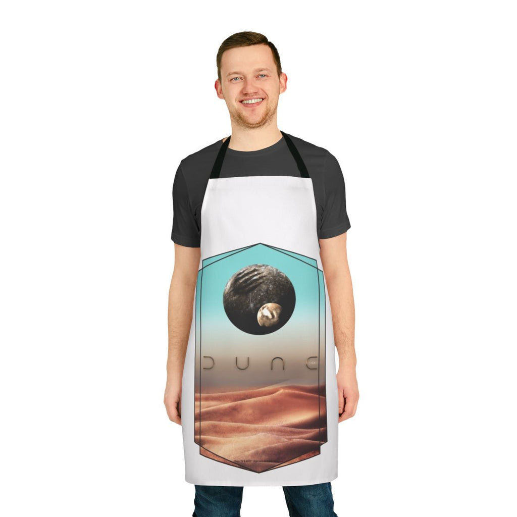 Dune-inspired apron featuring a stylized design of the planet Arrakis and the House Atreides crest