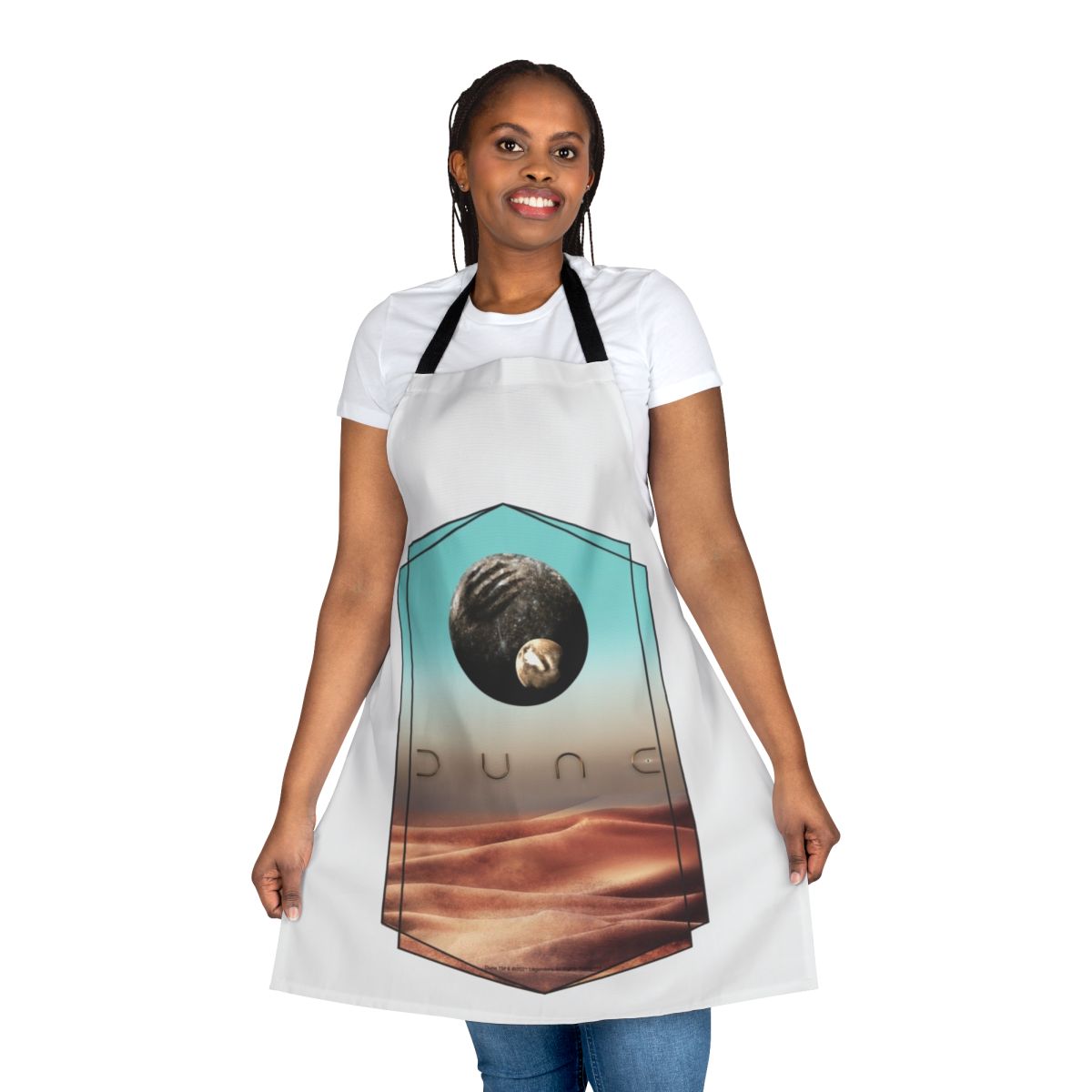 Dune-inspired apron featuring a stylized design of the planet Arrakis and the House Atreides crest