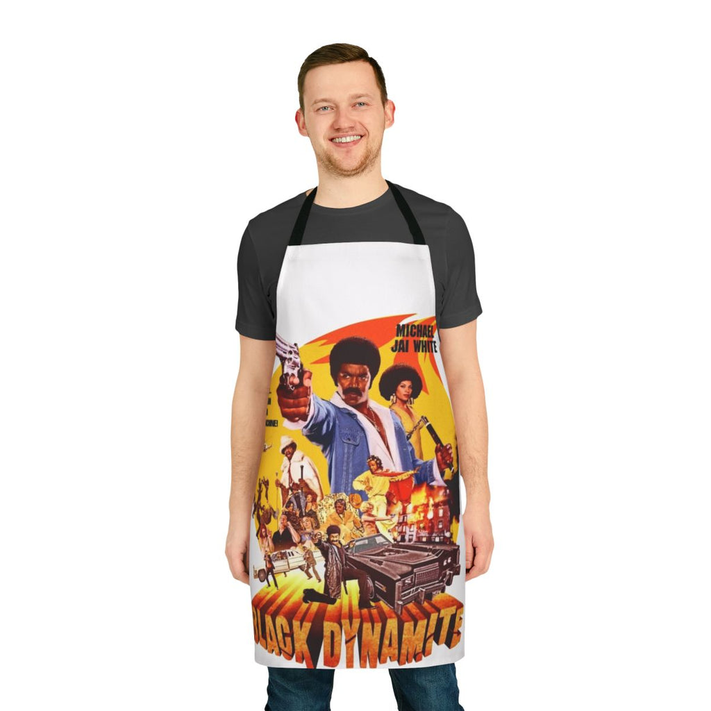 Black apron with a bold Dynamite design, perfect for cooking, grilling, and protecting clothes from stains and spatter.
