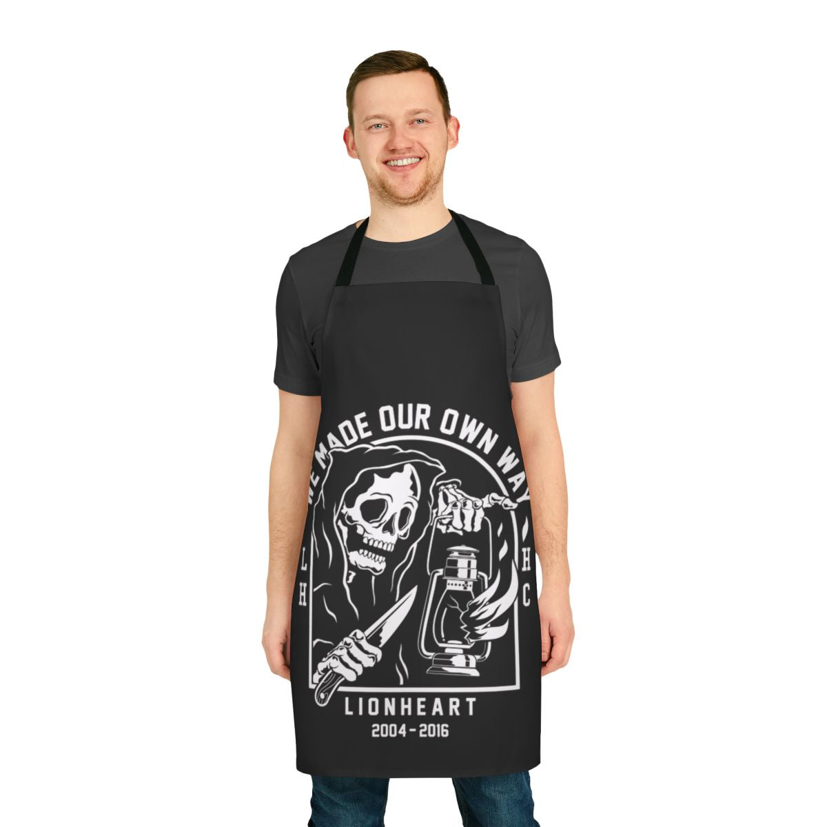 Apron featuring a Lionheart-inspired metal music design with a skull, scythe, and lantern