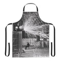 Apron with electric and lightning bolt design, inspired by Nikola Tesla's work on electricity and electromagnetism.
