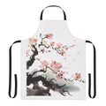 Stylish apron featuring a beautiful cherry blossom design, perfect for the kitchen or craft room.