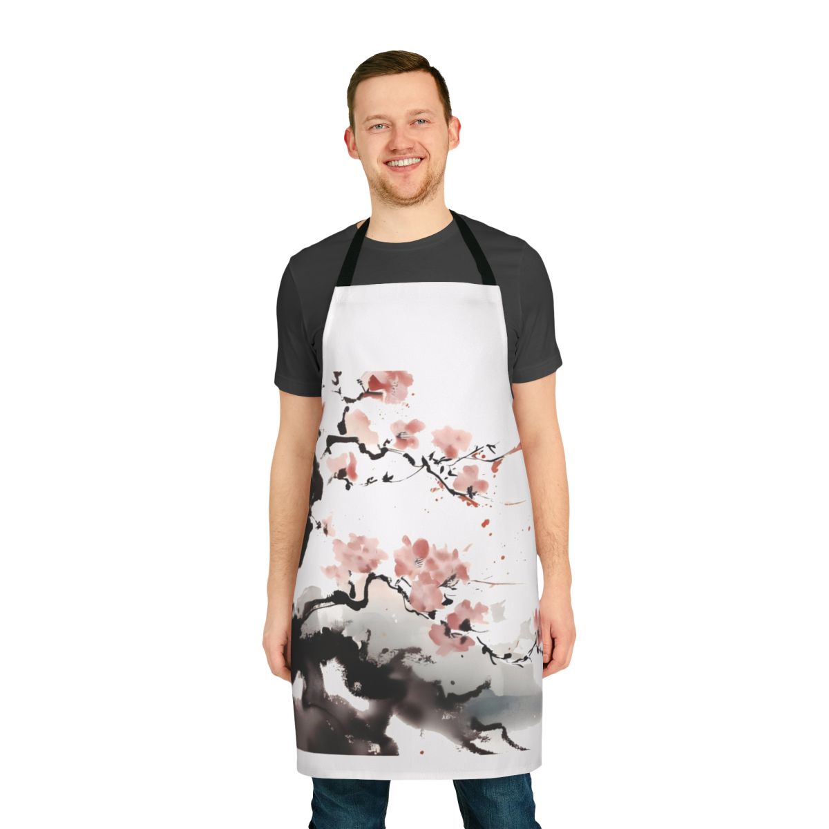 Stylish apron featuring a beautiful cherry blossom design, perfect for the kitchen or craft room.