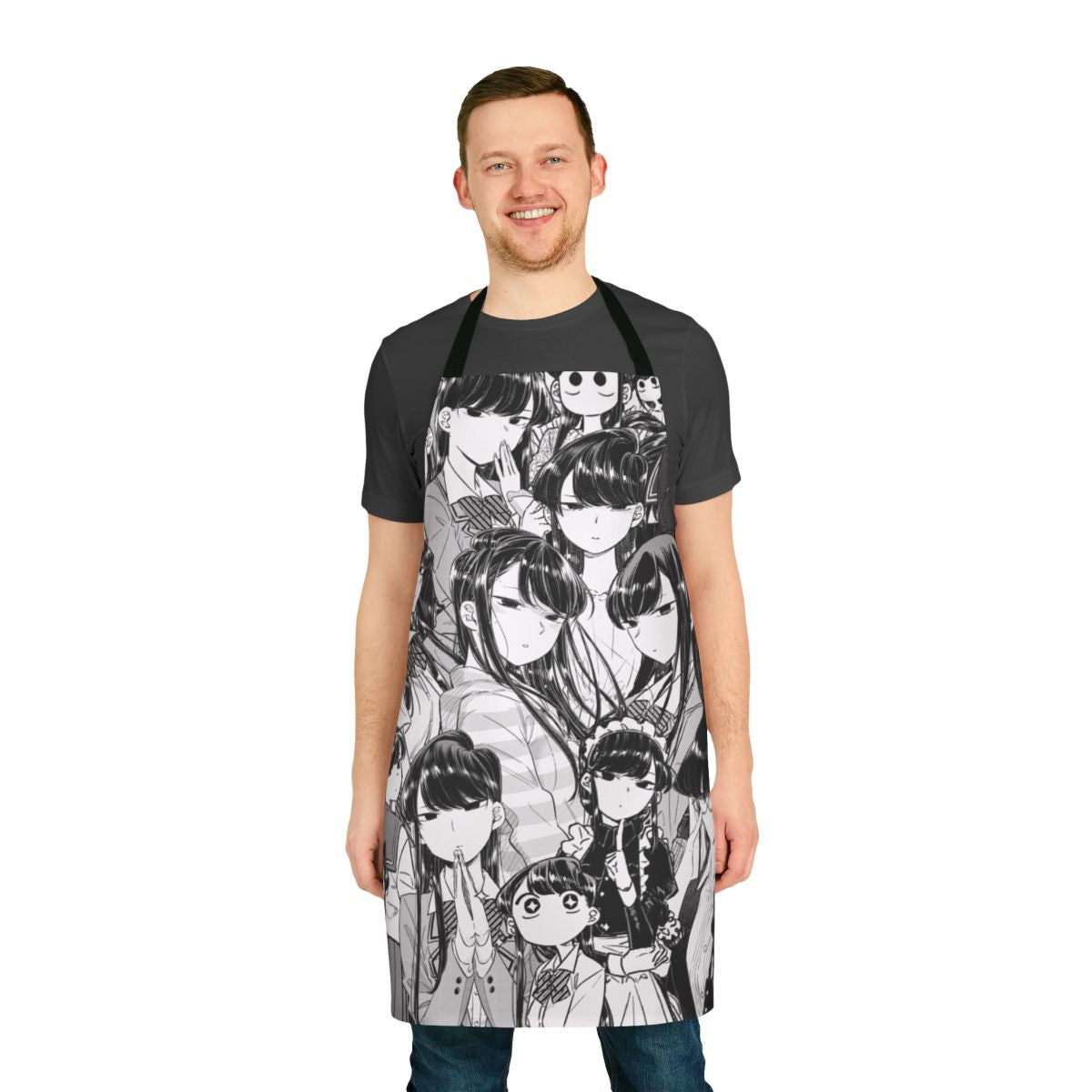 An apron featuring a collage design of the popular anime and manga character Komi-san in black and white.