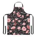 Stylish apron featuring a pink, black, and white botanical design with birds and flowers.