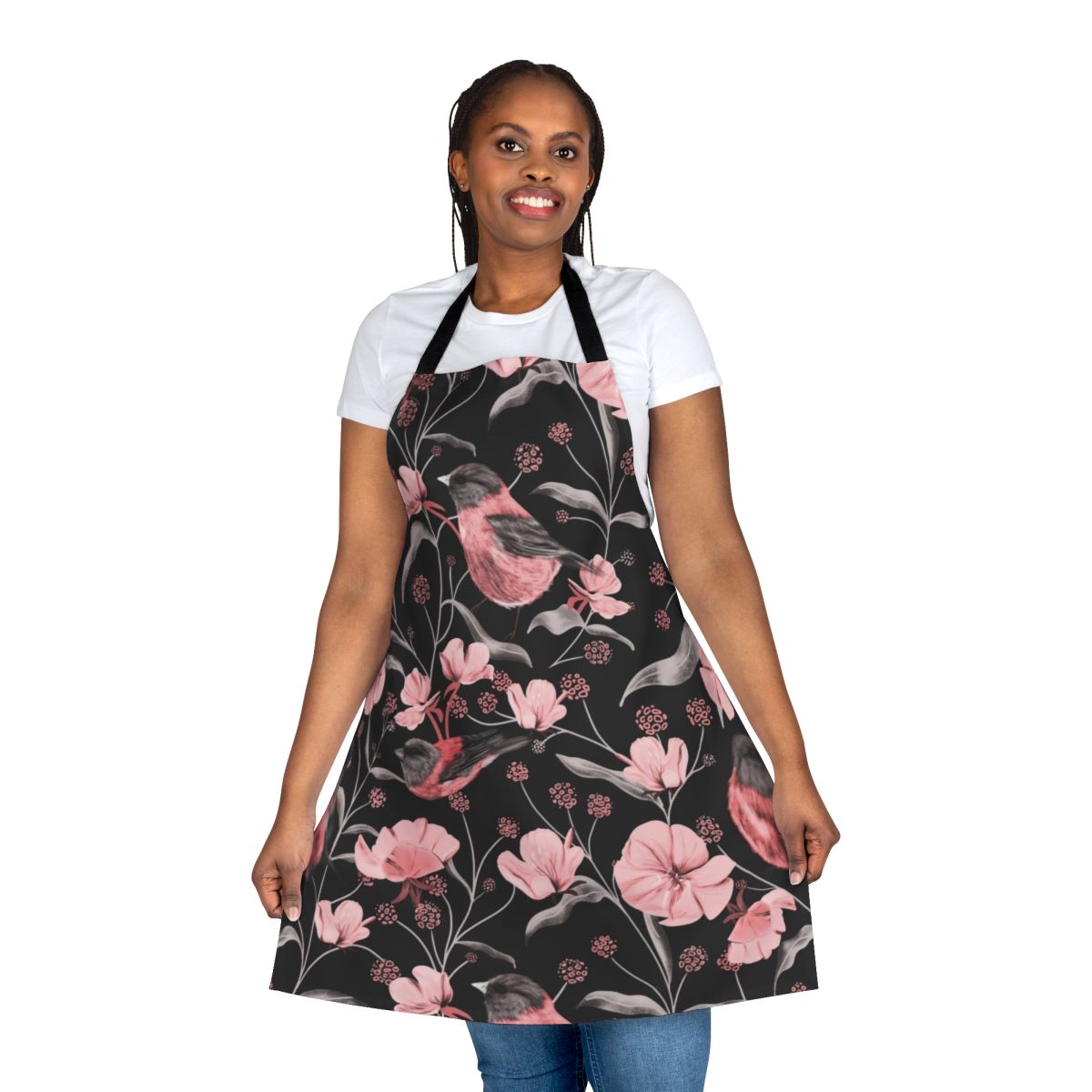 Stylish apron featuring a pink, black, and white botanical design with birds and flowers.