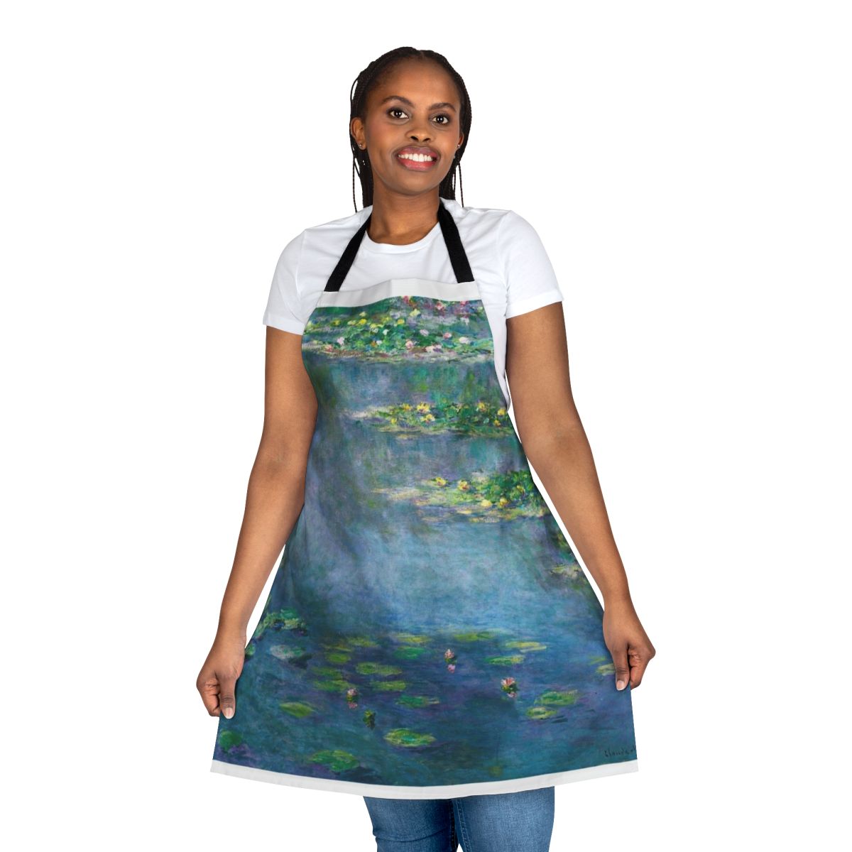 Apron featuring a vibrant water lily design inspired by the famous paintings of Claude Monet.