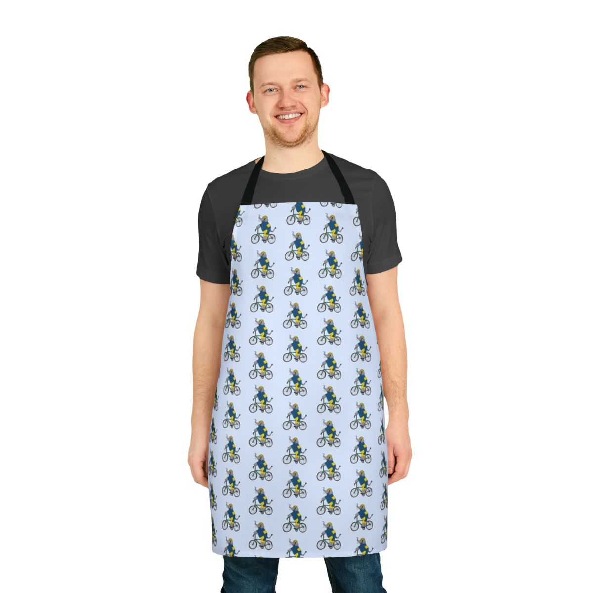Elephant wearing a bicycle and cycling themed apron