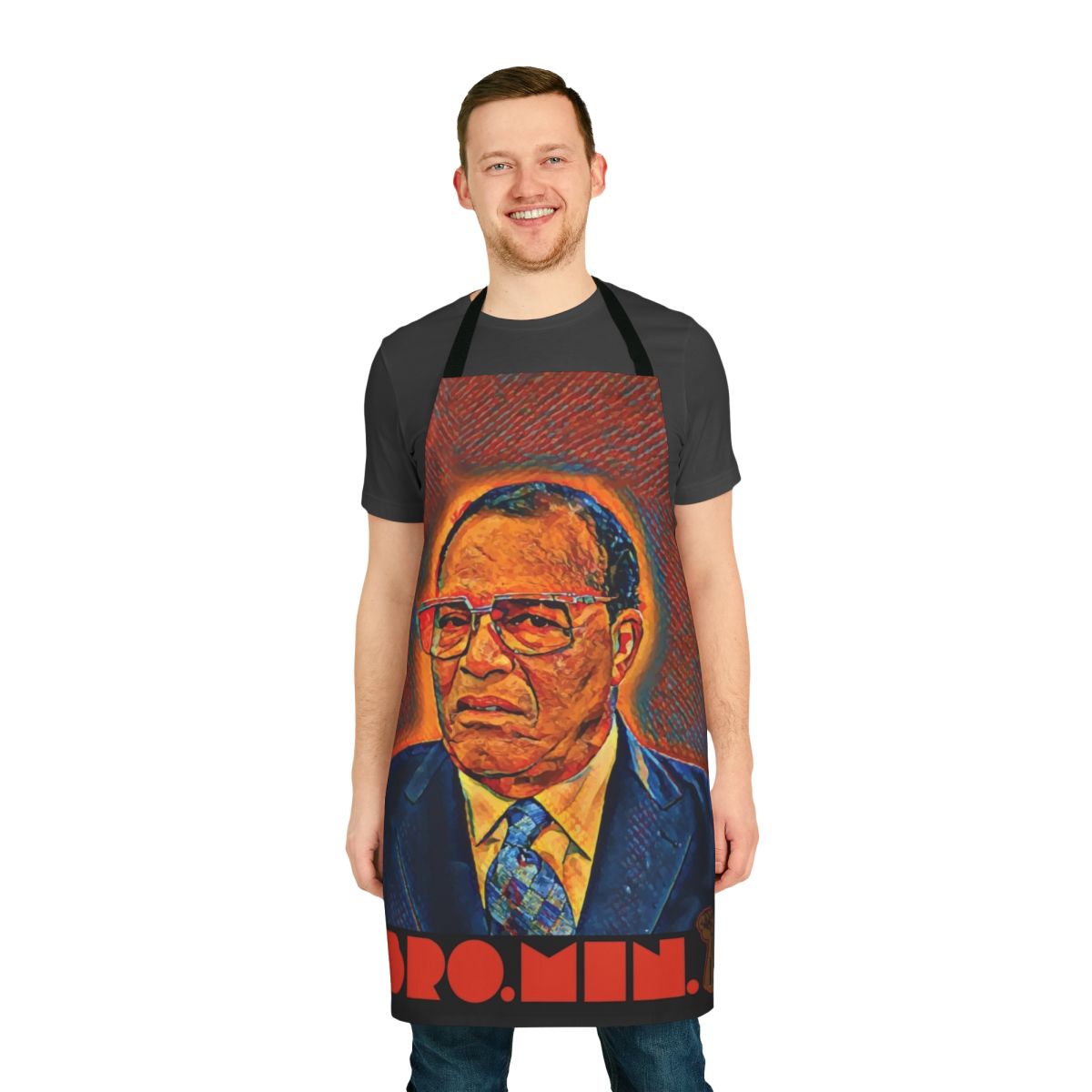 An apron featuring the image and quote of civil rights leader Louis Farrakhan.