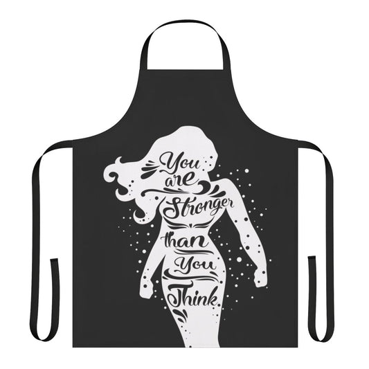 Woman wearing a black apron with the text "You Are Stronger" printed on it.