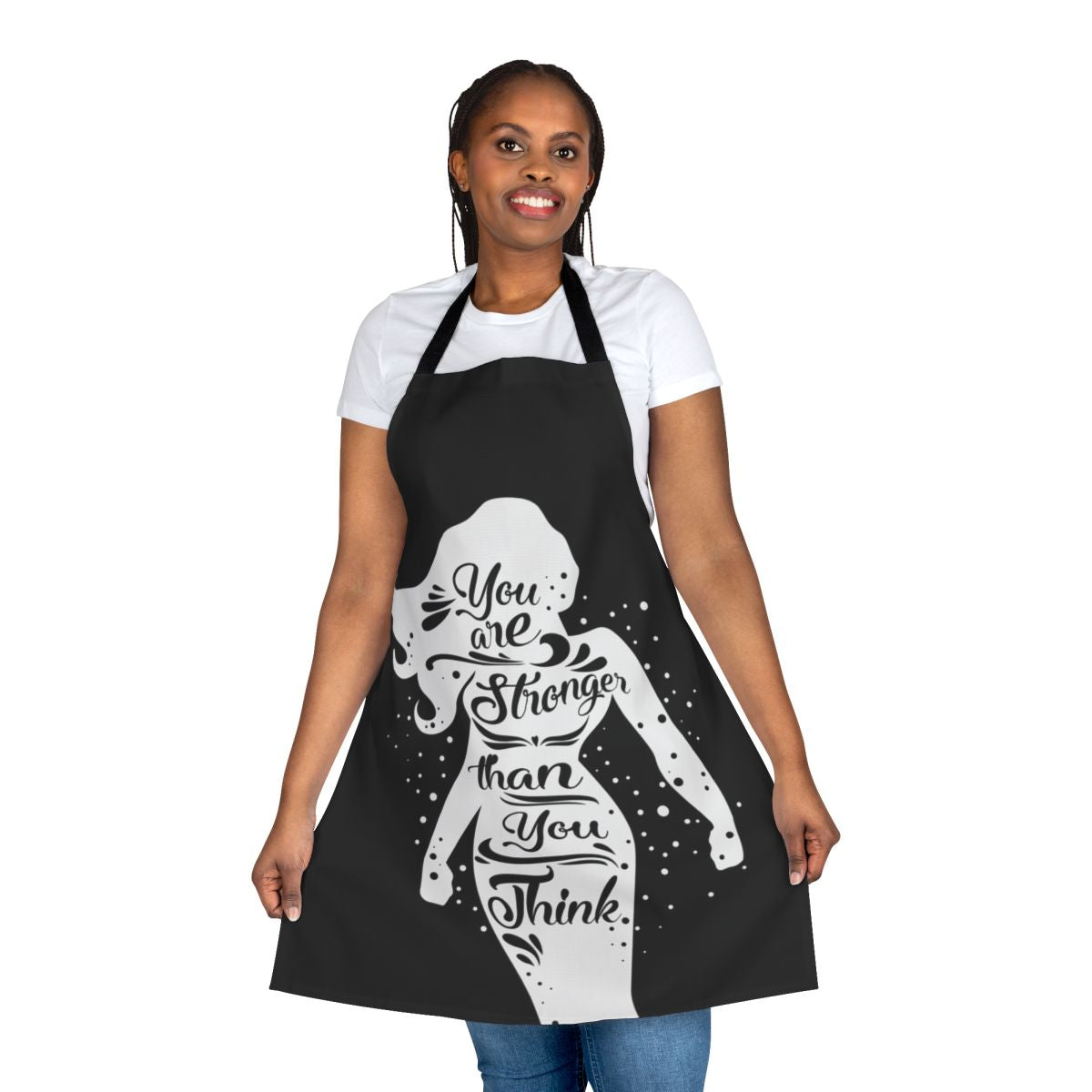 Woman wearing a black apron with the text "You Are Stronger" printed on it.