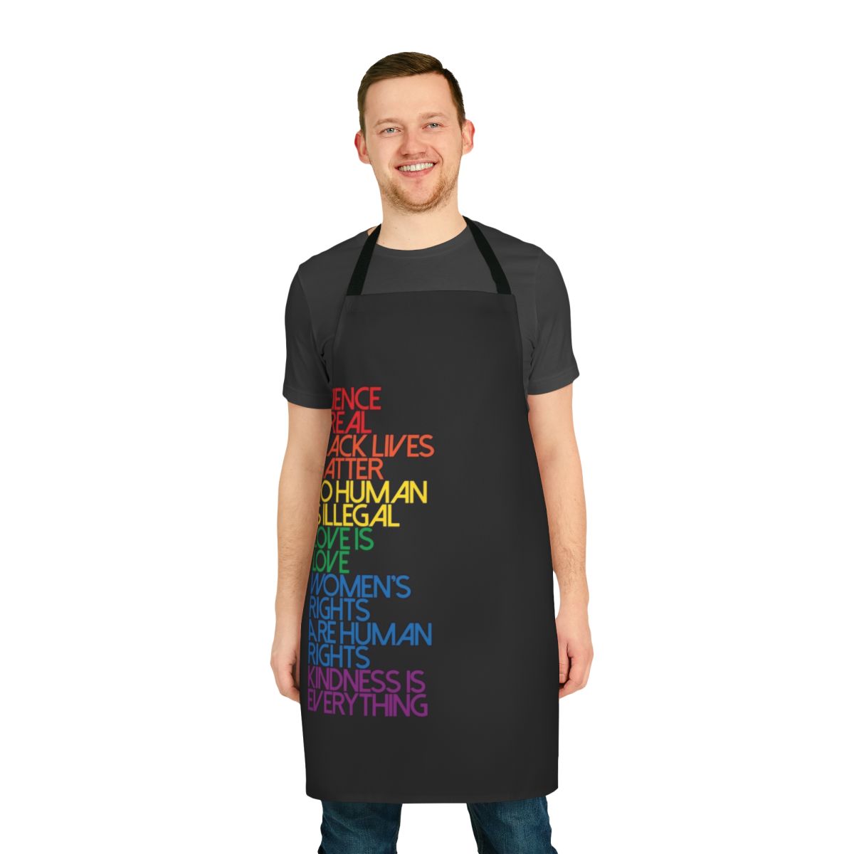 A black apron with the text "Science Is Real Black Lives Matter" printed on it.