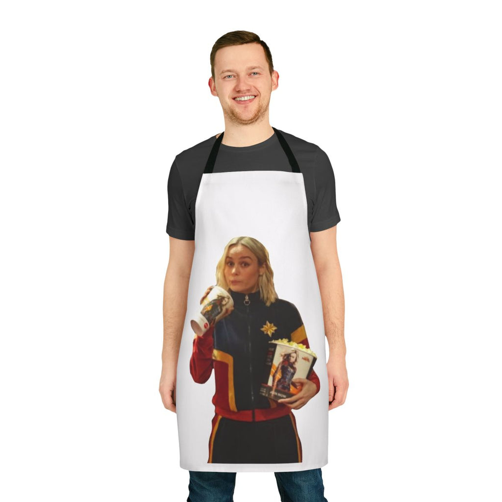 A vibrant apron featuring the iconic Captain Marvel logo and colors, designed to empower women in the kitchen and beyond.